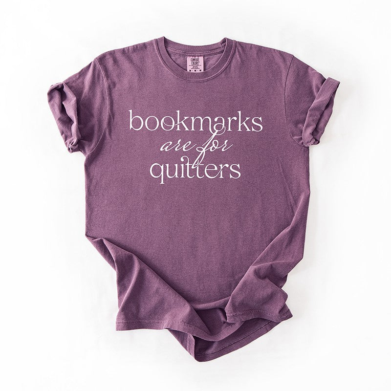Flat lay of berry “Bookmarks Are for Quitters” book lover tee – cozy heavyweight reading t-shirt