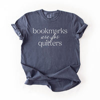 Flat lay of denim “Bookmarks Are for Quitters” tee – cozy bookish tee for readers and writers