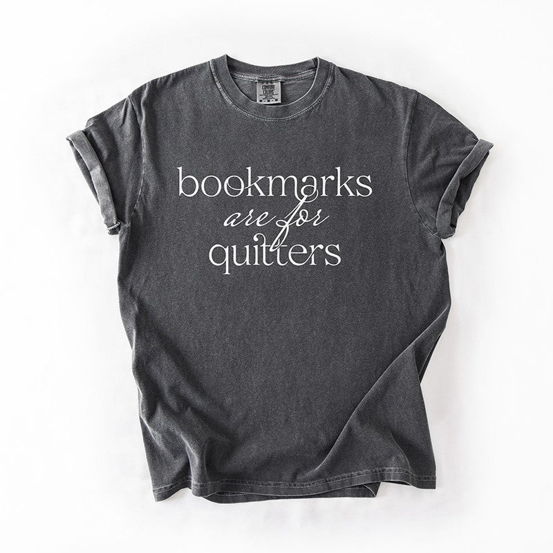 Flat lay of pepper “Bookmarks Are for Quitters” tee – funny unisex reading t-shirt for book lovers