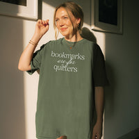Woman wearing hemp “Bookmarks Are for Quitters” tee with cozy oversized fit – reading t-shirt for book club fans