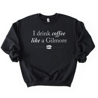 Flat lay of black Gilmore Girls coffee sweatshirt – cozy unisex fan apparel