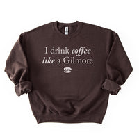 Flat lay of dark chocolate Gilmore Girls coffee sweatshirt – unisex cozy fall pullover