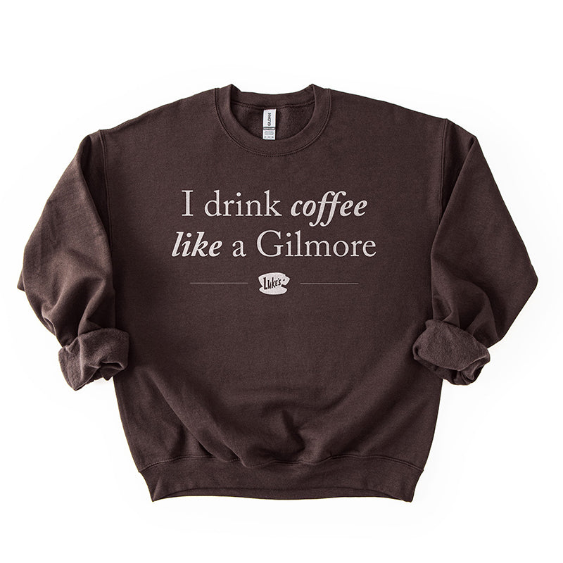 Flat lay of dark chocolate Gilmore Girls coffee sweatshirt – unisex cozy fall pullover