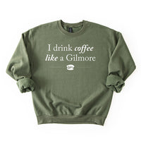 Flat lay of military green Gilmore Girls coffee sweatshirt – unisex pullover for fall and winter