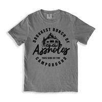 Flat lay of grey funny camping tee — Drunkest Bunch of Assholes campground graphic t-shirt