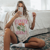 Model wearing Flower Market tee in dust — lightweight floral graphic tee for spring