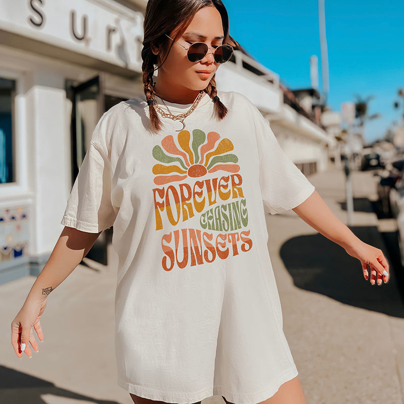 Model styled in ivory chasing sunsets shirt — soft bohemian summer tee for golden hour lovers