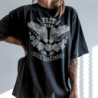 Model wearing Free Bird tee in black — vintage-inspired boho graphic t-shirt for women