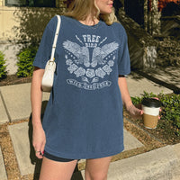 Model wearing Free Bird tee in denim — vintage-inspired boho graphic t-shirt for women