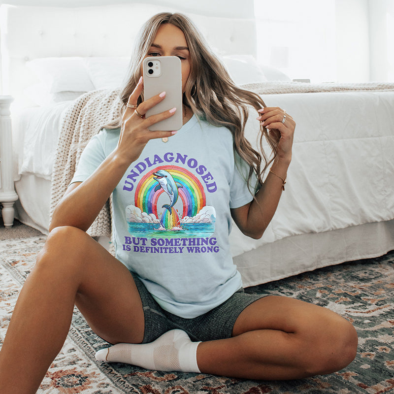 Model wearing ice blue lightweight tee — funny mental health inspired graphic shirt