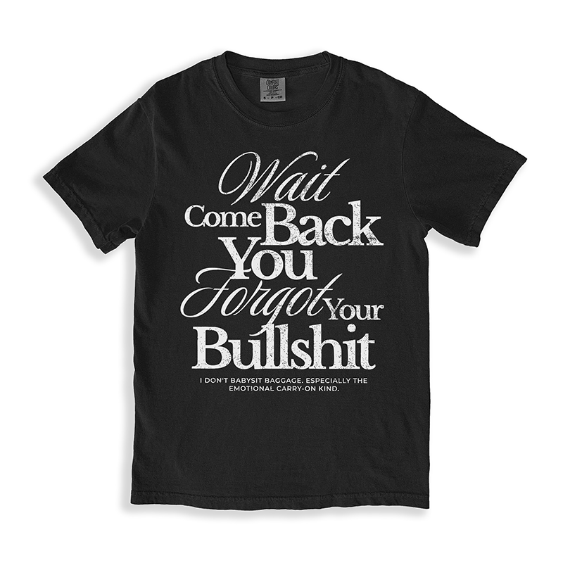 Flat lay of the Wait Come Back You Forgot Your Bullshit tee in black – vintage-inspired unisex fit with bold white print.