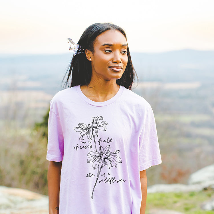In A Field Of Roses She Is A Wildflower Tee (Wholesale)